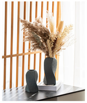 Narni Scalo twisted ceramic vase with a spiralling matte form