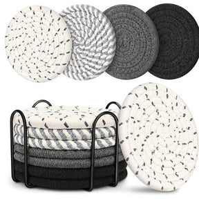 Cheshunt beige and black woven cotton coasters set of eight with metal holder on a table