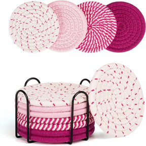 Cheshunt beige and pink woven cotton coasters set of eight with metal holder on a coffee table
