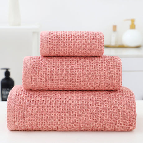 Pink waffle weave cotton towel set with bath towel, hand towel and face washer