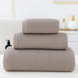 Brown waffle weave cotton towel set of 3 with bath towel, hand towel and face washer