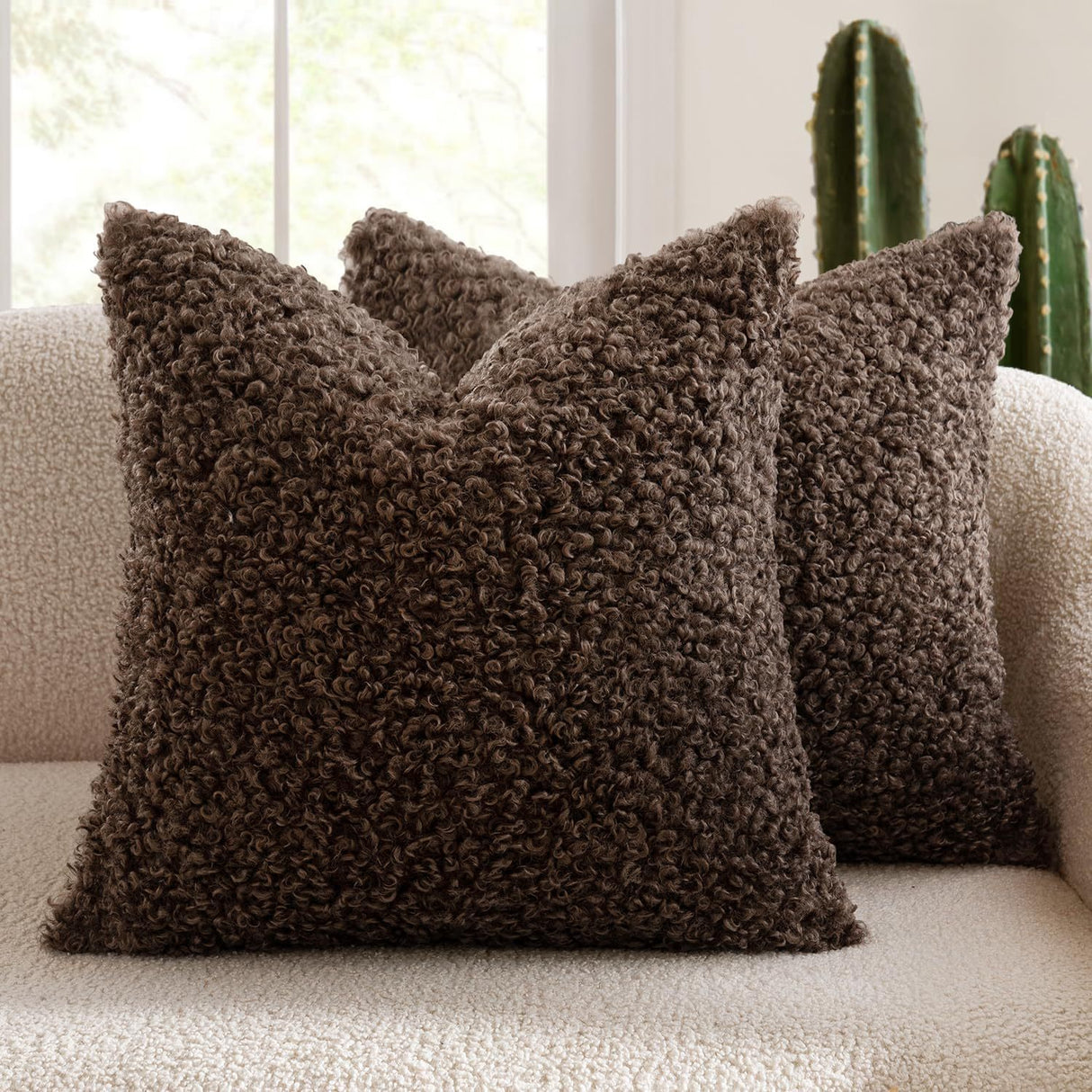 Dunkeld coffee teddy boucle decorative cushion covers on a styled sofa