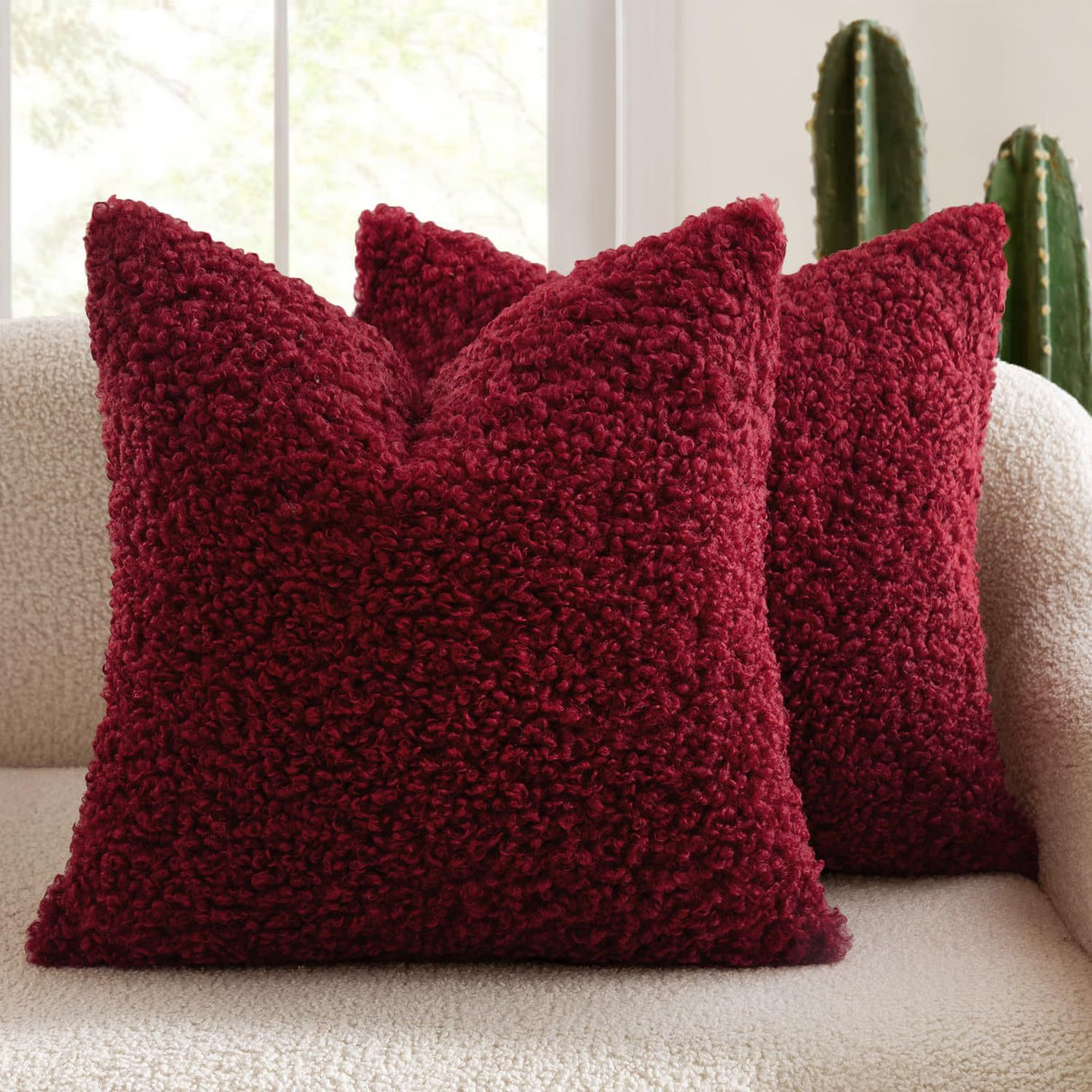 Dunkeld red teddy boucle decorative cushion covers on a styled sofa