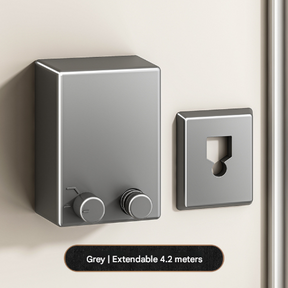 Warwick grey retractable stainless steel clothesline extended in a laundry