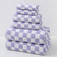 Purple cotton gauze six piece towel set with bath towels, hand towels and face washers folded together