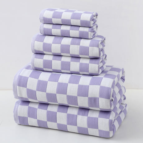 Purple cotton gauze six piece towel set with bath towels, hand towels and face washers folded together