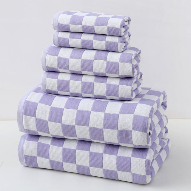 Purple cotton gauze six piece towel set with bath towels, hand towels and face washers folded together
