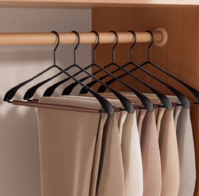 Oakey natural solid wood clothes hangers, 6pcs, hanging on a wardrobe rail