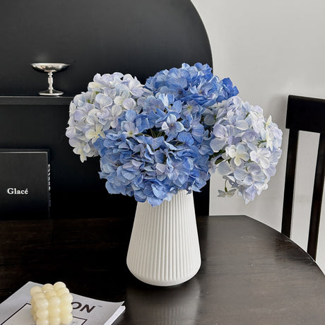 Artificial light blue hydrangea stems arranged in vase showing full height — Allure Home Collections