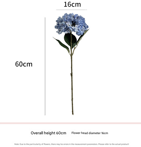 Light blue artificial hydrangea flowers styled on dining table — Allure Home Collections