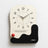 Abstract Wavy Wall Clock with Ceramic Accent — Black, Green and Brown — Allure Home Collections
