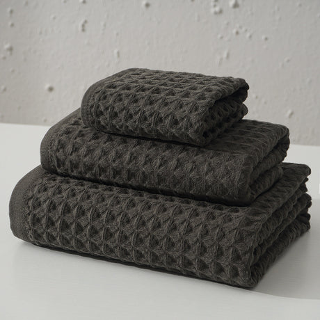 Three piece dark brown waffle weave cotton towel set with bath towel, hand towel and washcloth