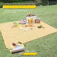 Grange yellow lightweight picnic mat 2 x 2m folded beside its drawstring bag showing printed top and reflective aluminium foil base