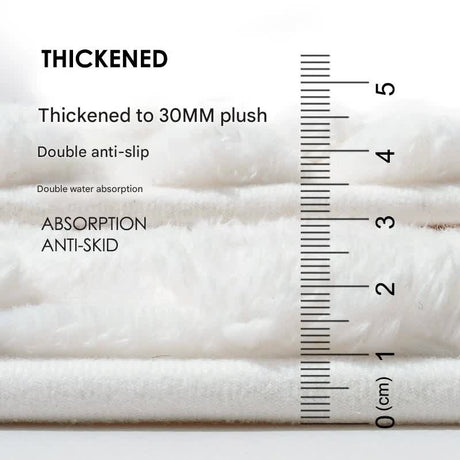 Feet being dried on the drying panel of a memory foam bath mat