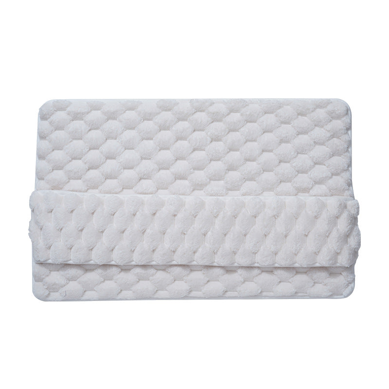Side view of memory foam bath mat showing thickness and non skid backing