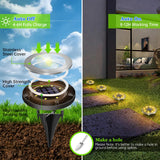 Stainless steel solar in-ground spike light with warm yellow glow