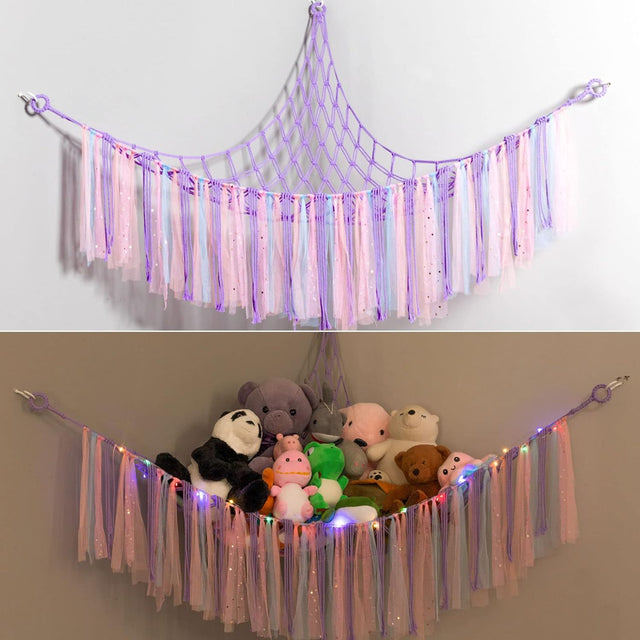 Corner plush toy storage hammock with purple ribbon accent