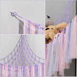 Corner plush toy storage hammock with purple ribbon accent