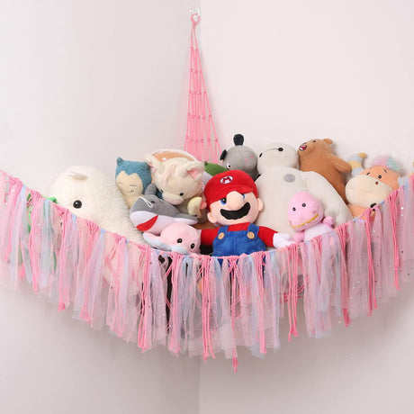 Corner plush toy storage hammock with pink ribbon accent