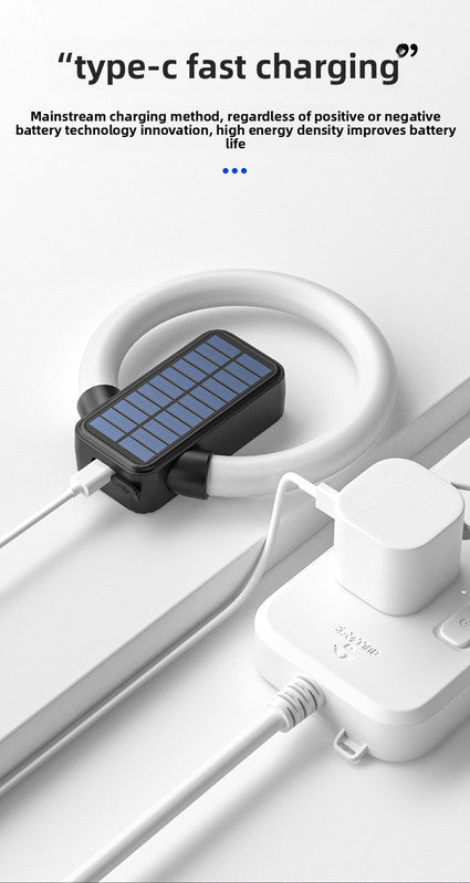 Circular solar outdoor wall light with RGB and white LED and USB charging