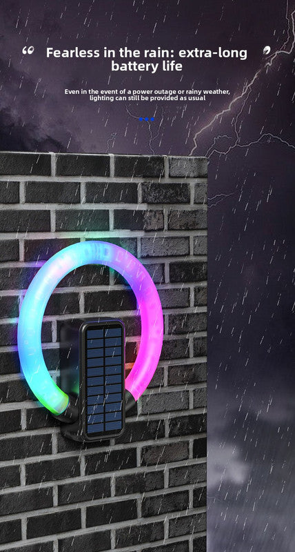 Circular solar outdoor wall light with RGB and white LED and USB charging