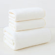 Beige coral fleece towel set of 6 with 2 bath towels and 4 face towels, folded