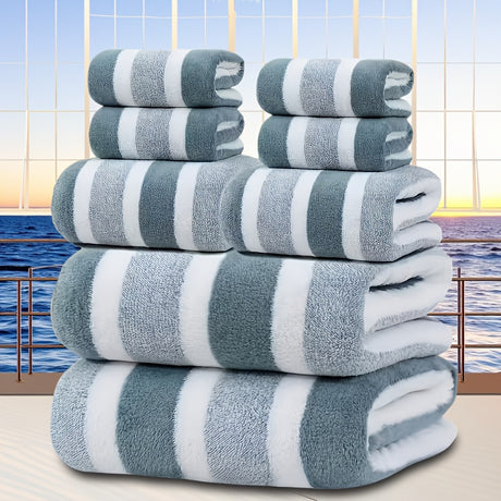 Eight piece green coral fleece towel set with bath sheets, towels and face cloths in a wide stripe texture