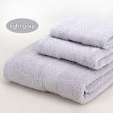 Light grey 3 piece cotton jacquard towel set with bath towel, hand towel and face washer