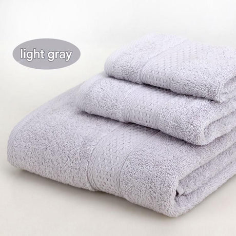 Light grey 3 piece cotton jacquard towel set with bath towel, hand towel and face washer