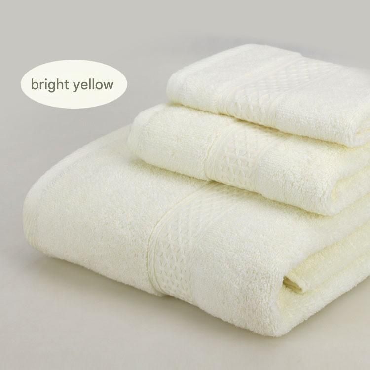 Bright yellow 3 piece cotton jacquard towel set with bath towel, hand towel and face washer