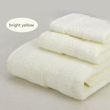 Bright yellow 3 piece cotton jacquard towel set with bath towel, hand towel and face washer