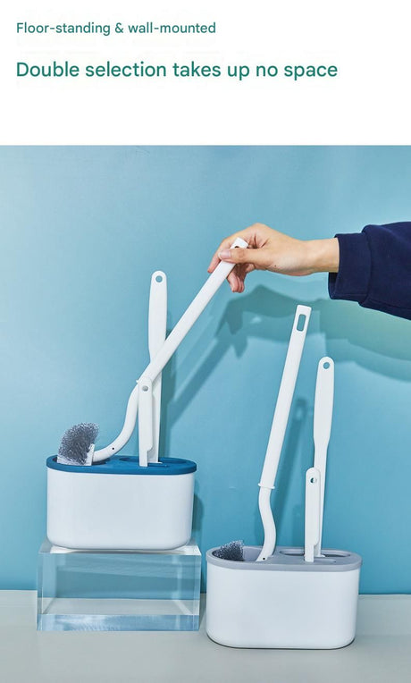 White toilet brush set mounted on a bathroom wall, floor left clear