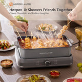 Cool touch side handles on the grey electric hot pot