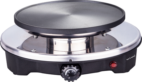 Fondue pot with stainless steel cover and six fondue forks in place