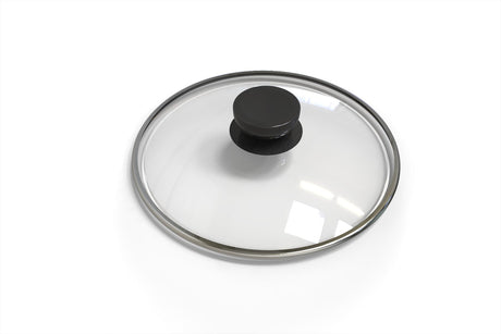 Hot pot in use at a dining table with broth simmering