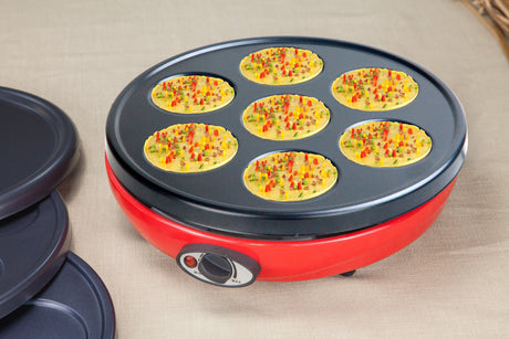 Three interchangeable non stick plates: flat, grill and pikelet pans