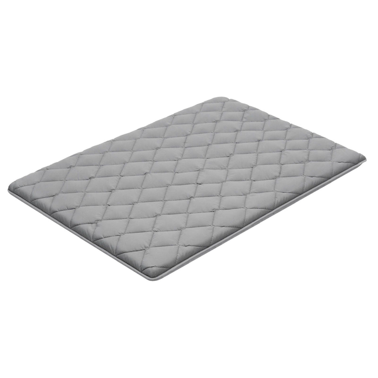 Mission Beach grey foldable tatami mattress in an outdoor setting