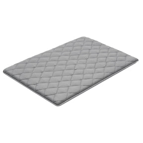 Mission Beach grey foldable tatami mattress in an outdoor setting