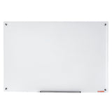 Glass whiteboard in use in a home office above a desk