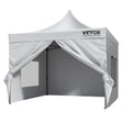 White 3 x 3 m pop up gazebo with sidewalls fitted, set up outdoors
