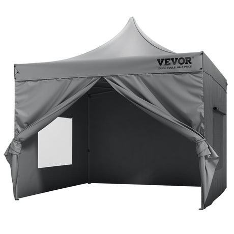 White 3 x 3 m pop up canopy with sidewalls set up on a lawn