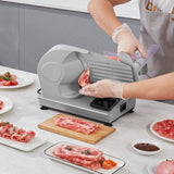 Slicer with blade, food holder and pusher removed for cleaning