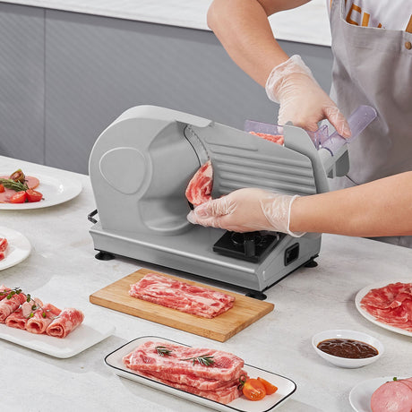 Slicer with blade, food holder and pusher removed for cleaning