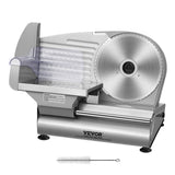 Electric slicer cutting thin slices of ham for sandwiches