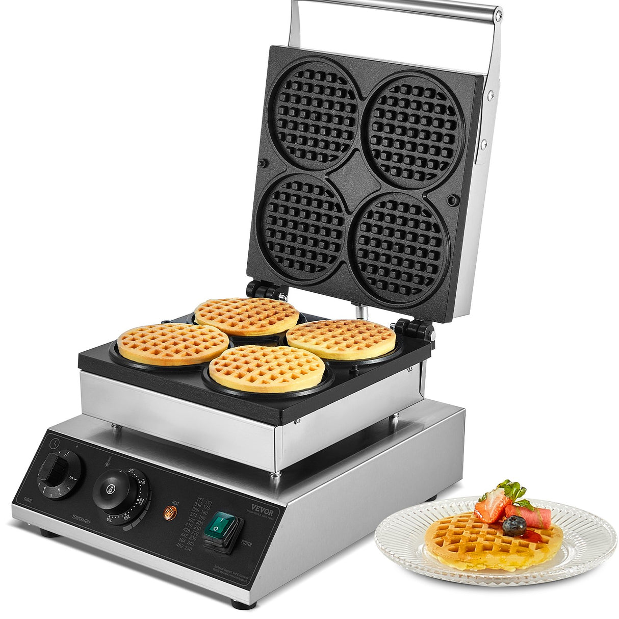 Commercial waffle maker cooking four round Belgian waffles in stainless steel