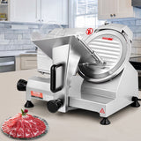 Cheese being cut on the electric meat slicer