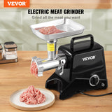 Front view of the meat grinder showing the grinding head and control switches