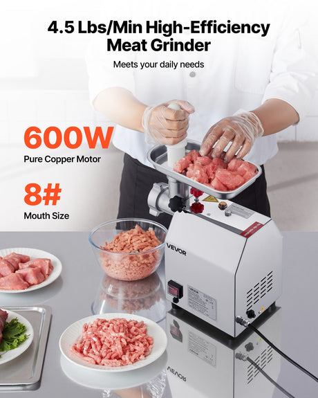 Front view of the meat grinder showing the control switch and grinding head