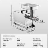 Meat being fed into the hopper of the countertop grinder