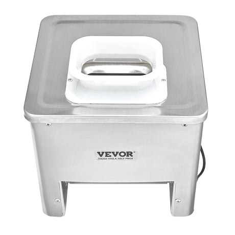 Stainless steel meat slicer shown with sliced vegetables and meat